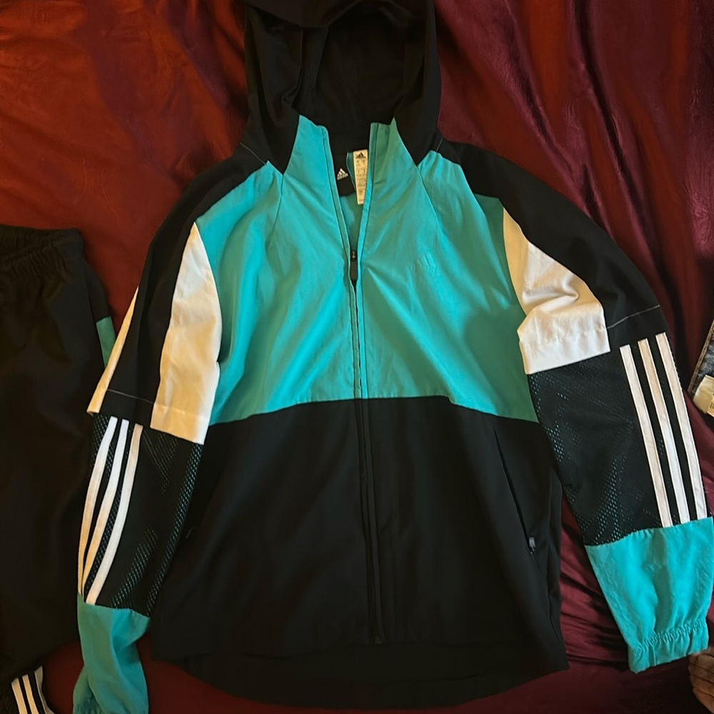 Women’s Adidas windbreaker tracksuit. Great condition.
